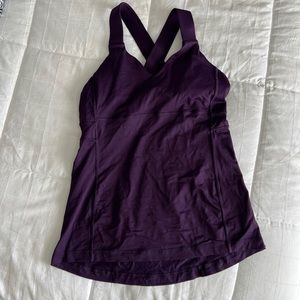 Purple lululemon tank top with cross back design